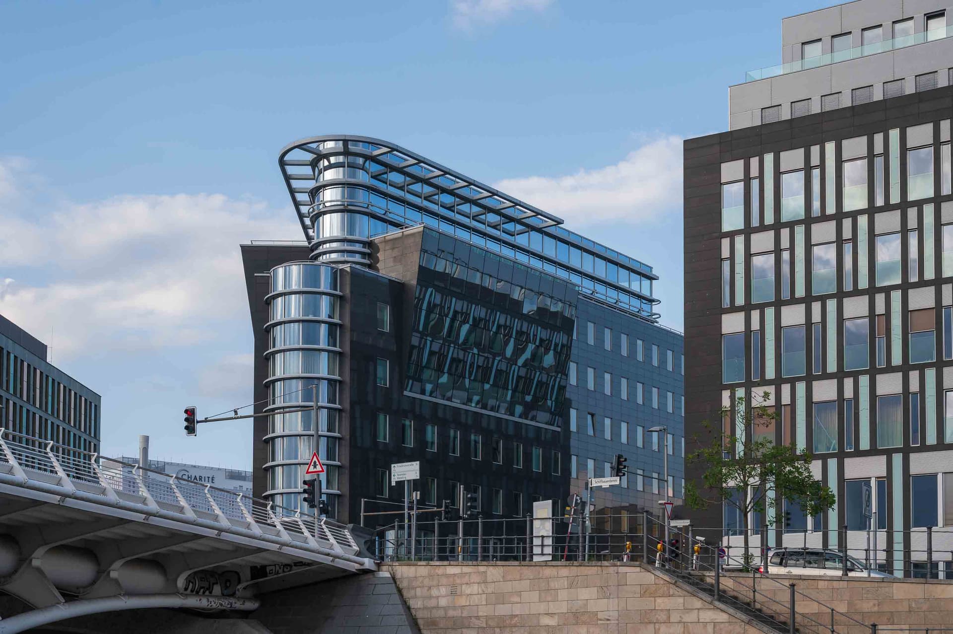 Contemporary glass-and-steel architecture, steps from the Charité hospital.